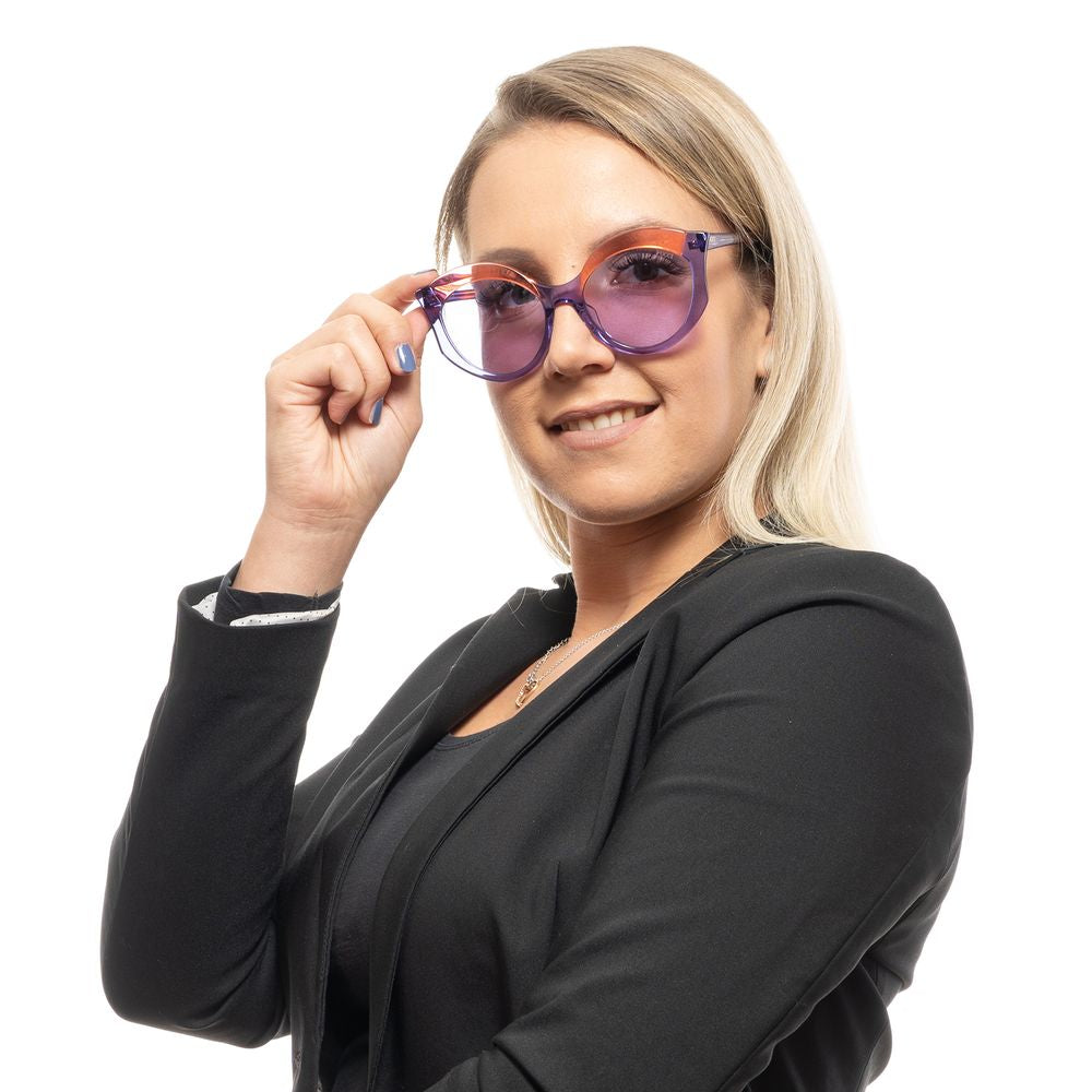 Woman wearing Emilio Pucci purple butterfly sunglasses with full-rim plastic frame and 100% UVA & UVB protection.