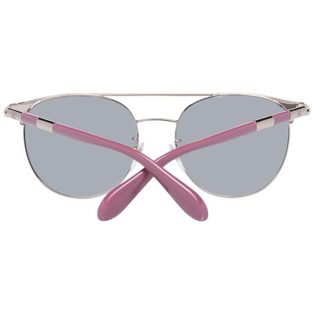 Carolina Herrera silver aviator sunglasses for women with full-rim style and blue lenses, featuring spring hinges and metal-plastic frame.