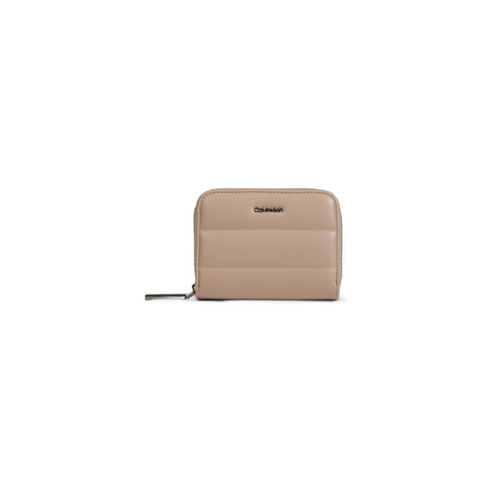 Calvin Klein women's beige faux leather wallet from Fall/Winter collection.