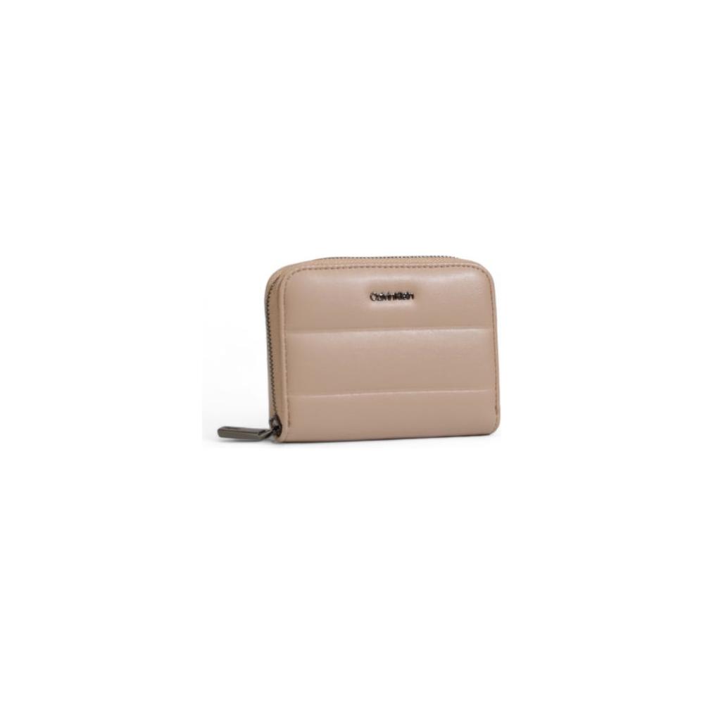 Calvin Klein women's gray faux leather wallet, Fall/Winter collection, compact zip-around design for stylish organization.