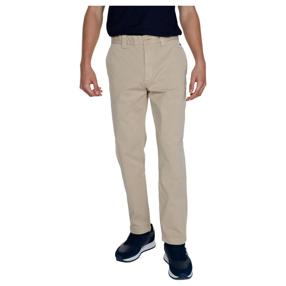 Men's Tommy Hilfiger gold recycled cotton jeans, fall/winter collection, 96% cotton, 4% elastane, sustainable men's pants.