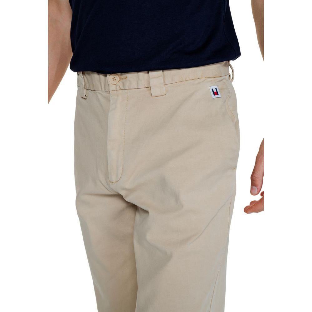 Men's beige recycled cotton jeans from Tommy Hilfiger Fall/Winter collection with logo detail.