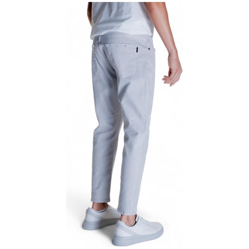 Man wearing Antony Morato gray cotton jeans, back view. Made of 98% cotton, 2% elastane for comfort and style, casual fit.