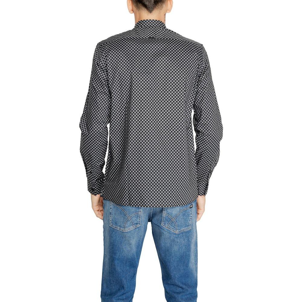 Back view of a man wearing an Antony Morato gray cotton shirt from the men's Fall/Winter collection, paired with blue jeans.