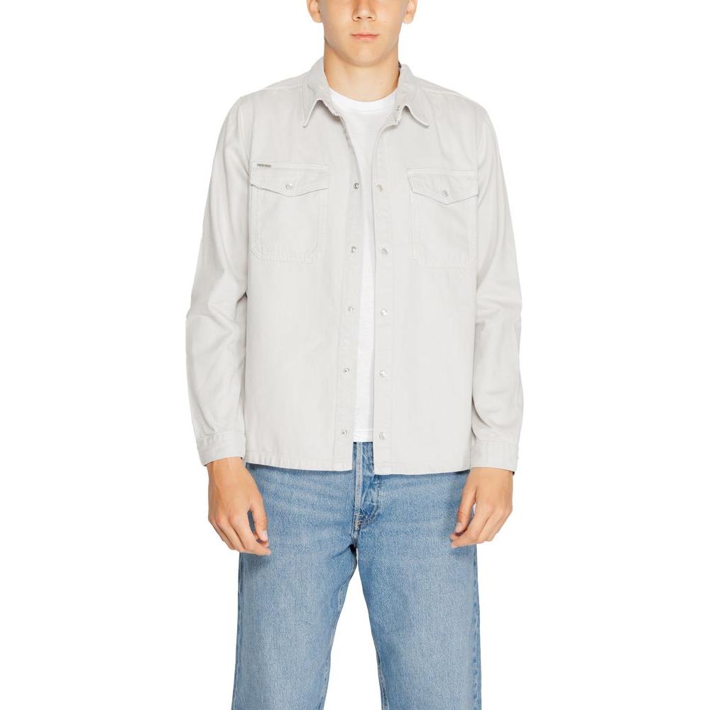 Antony Morato gray cotton men's shirt, part of the Fall/Winter collection, paired with jeans.