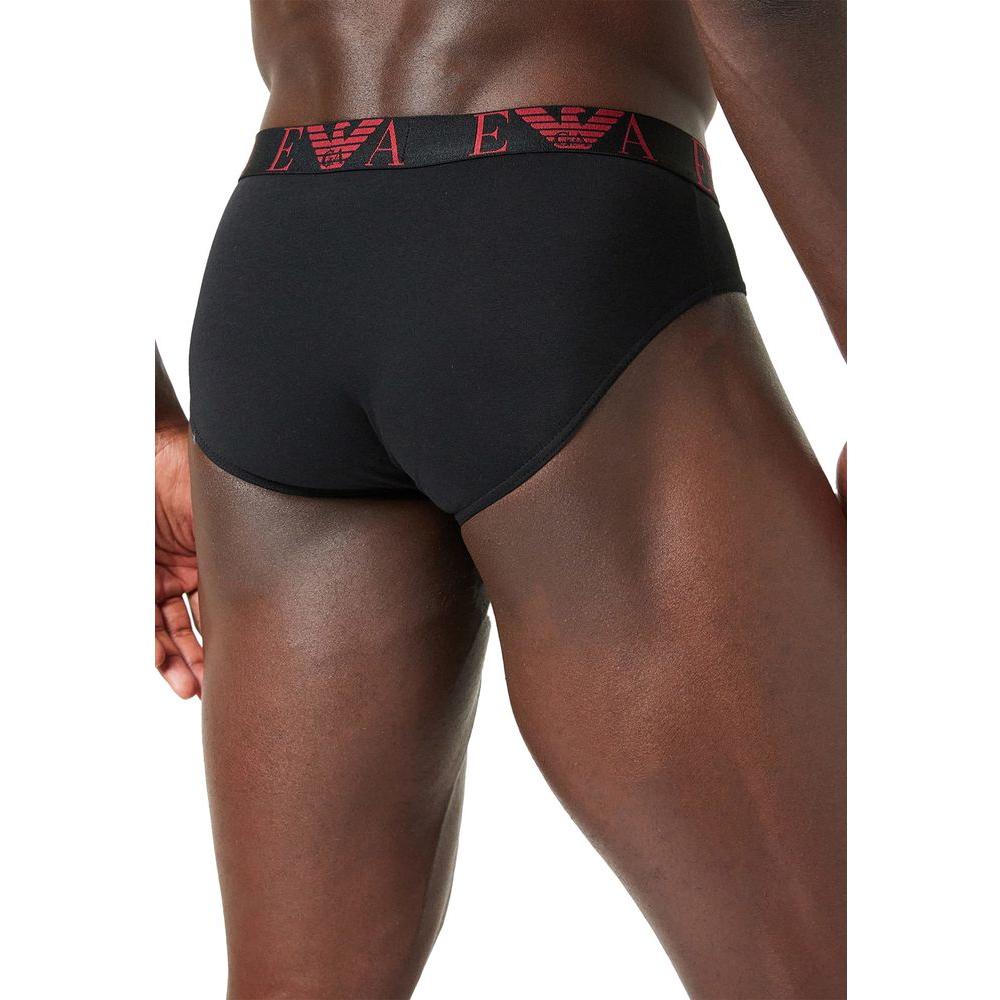 Emporio Armani black briefs with red logo waistband, rear view, highlighting snug fit and comfort for men.