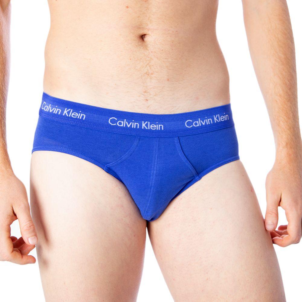 Calvin Klein men's blue cotton hip briefs with logo waistband offering comfort and style, perfect for everyday wear.