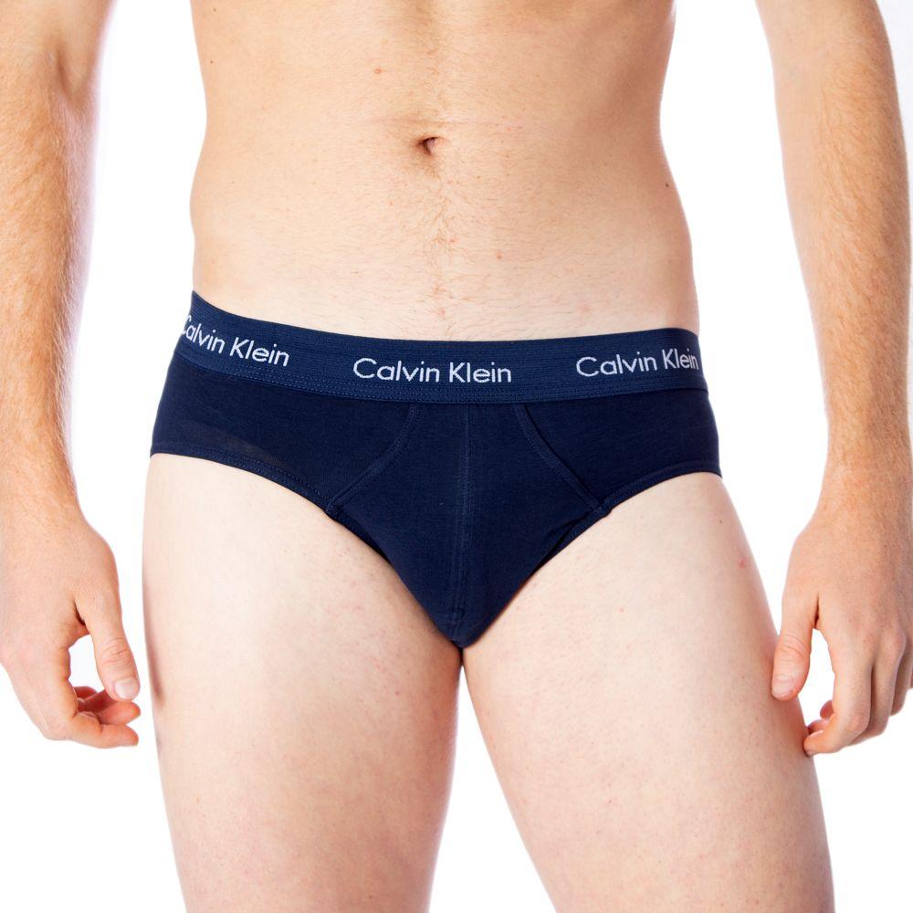 Man wearing Calvin Klein blue cotton underwear with logo waistband for men