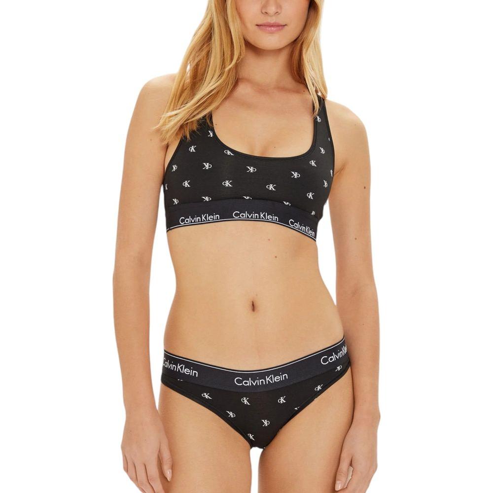 Calvin Klein black unlined bralette and underwear set with logo, featuring a comfortable cotton blend for a soft, natural fit.