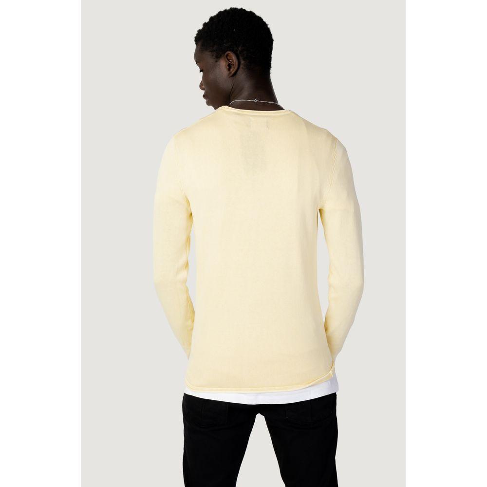 Back view of a man wearing an Only & Sons Yellow Cotton T-Shirt, part of the men's spring/summer jersey collection.