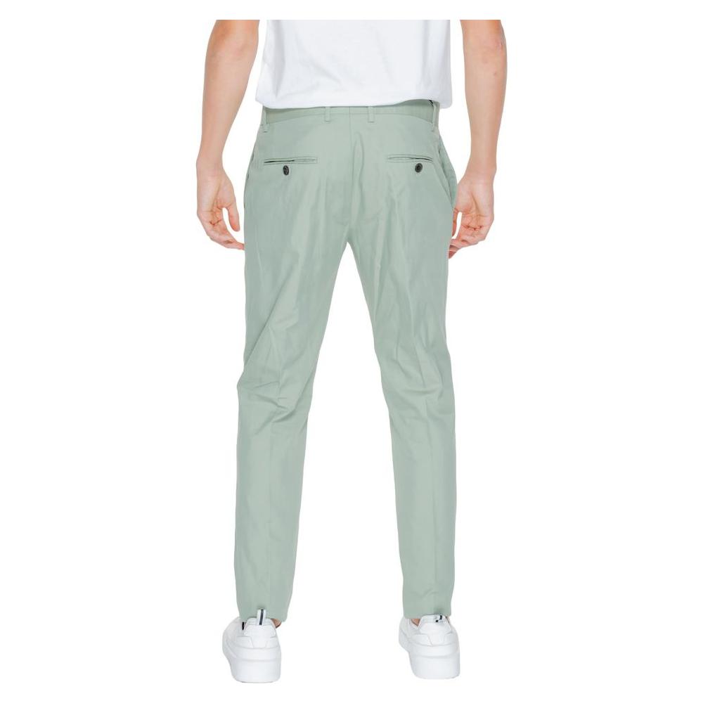 Back view of Antony Morato green cotton men's suit trousers for spring/summer, composed of cotton, modal, polyamide, and elastane.