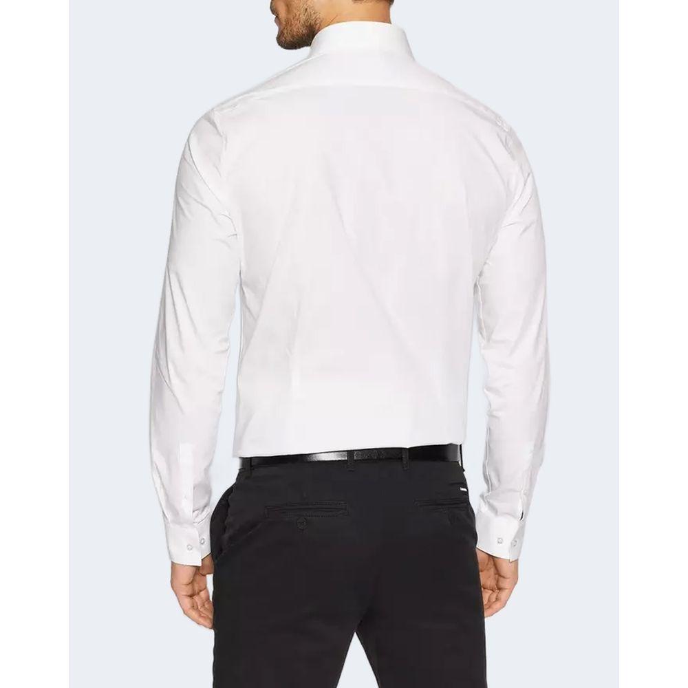 Calvin Klein white cotton shirt for men, long-sleeve, slim fit back view, styled with black pants, perfect for formal or casual occasions.