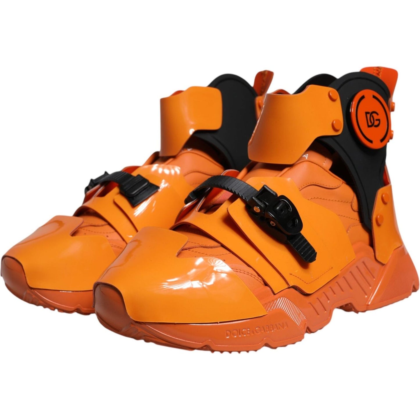 Dolce & Gabbana orange multi-panel chunky high top sneakers with buckle closure and logo, made in Italy, featuring ridged rubber sole.