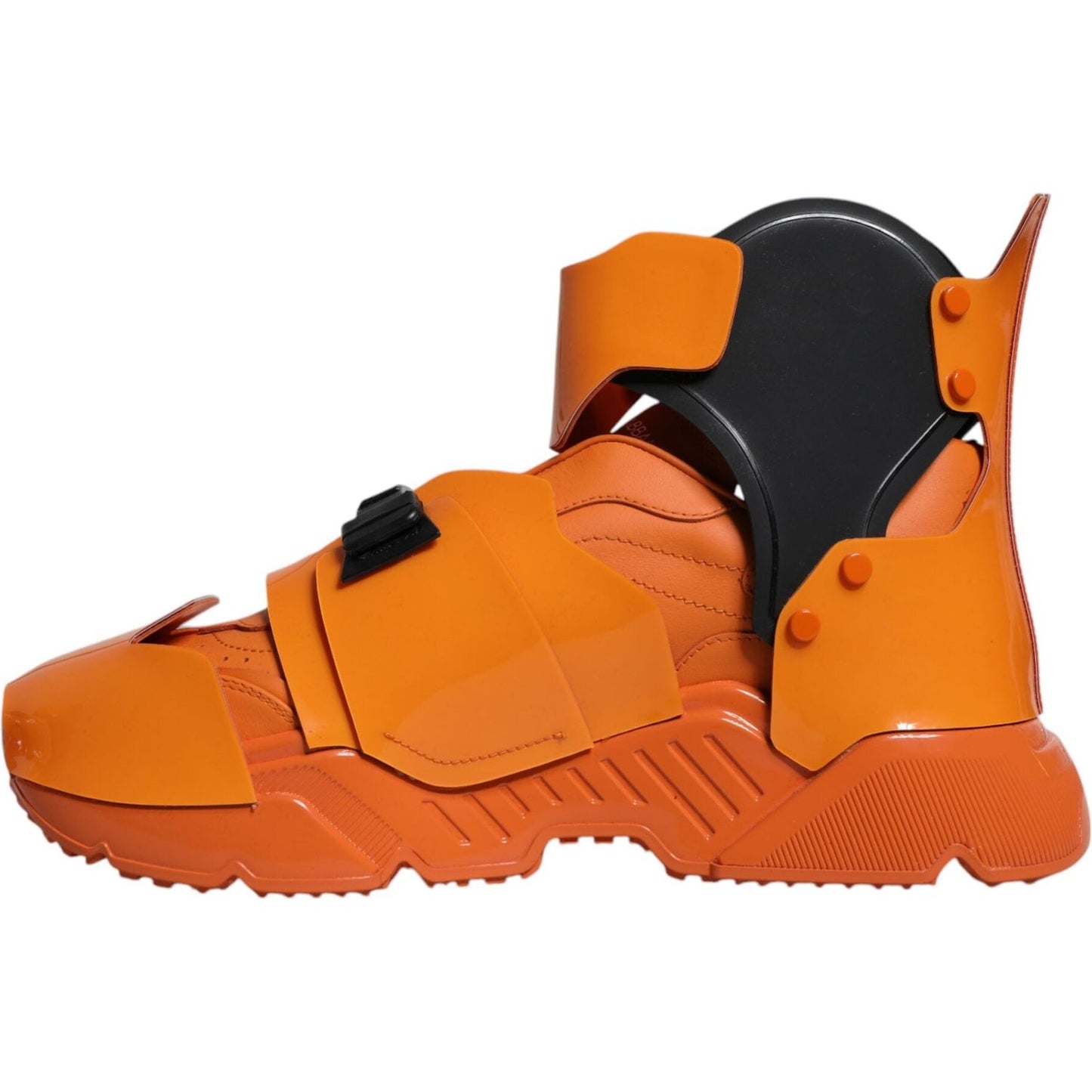 Dolce & Gabbana orange multi-panel chunky high top sneakers with buckle closure, round toe, and ridged rubber sole.