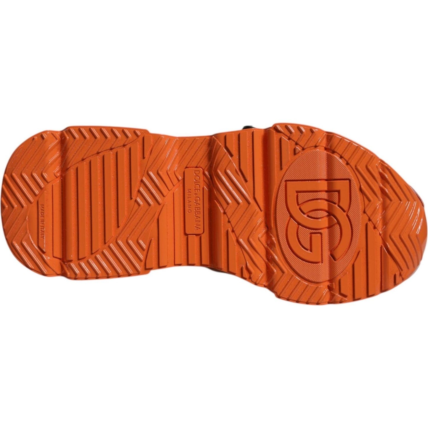 Orange sole of Dolce & Gabbana chunky high top sneakers with logo imprint and ridged rubber design.