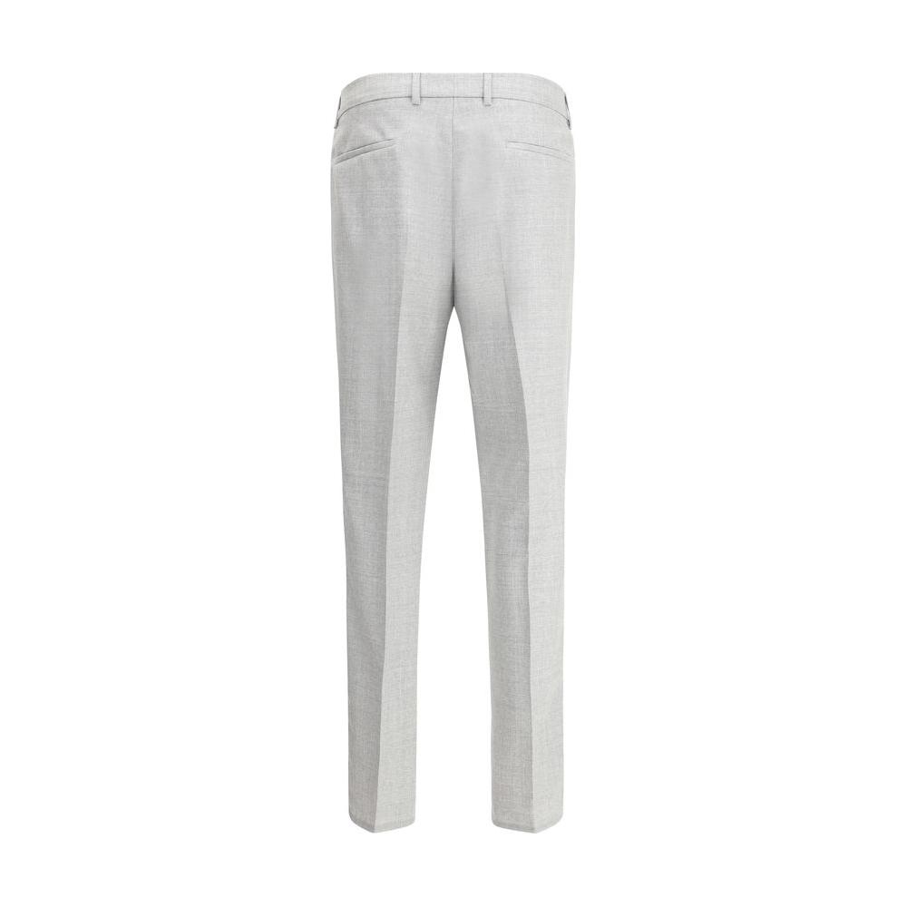Back view of Brunello Cucinelli virgin wool pants with belt loops and welt pockets, showcasing sophisticated style and functionality.