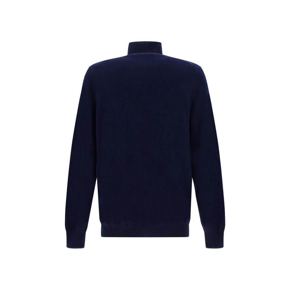 Back view of Brunello Cucinelli cashmere turtleneck sweater in navy blue with ribbed cuffs and hem.