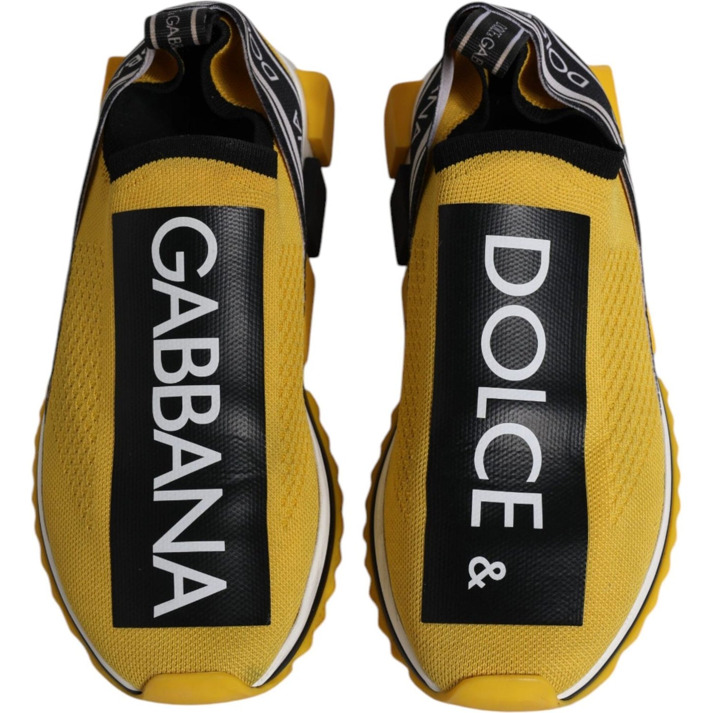 Dolce & Gabbana yellow black Sorrento sneakers with logo print, fabric pull strap, and black decorative rubber sole.
