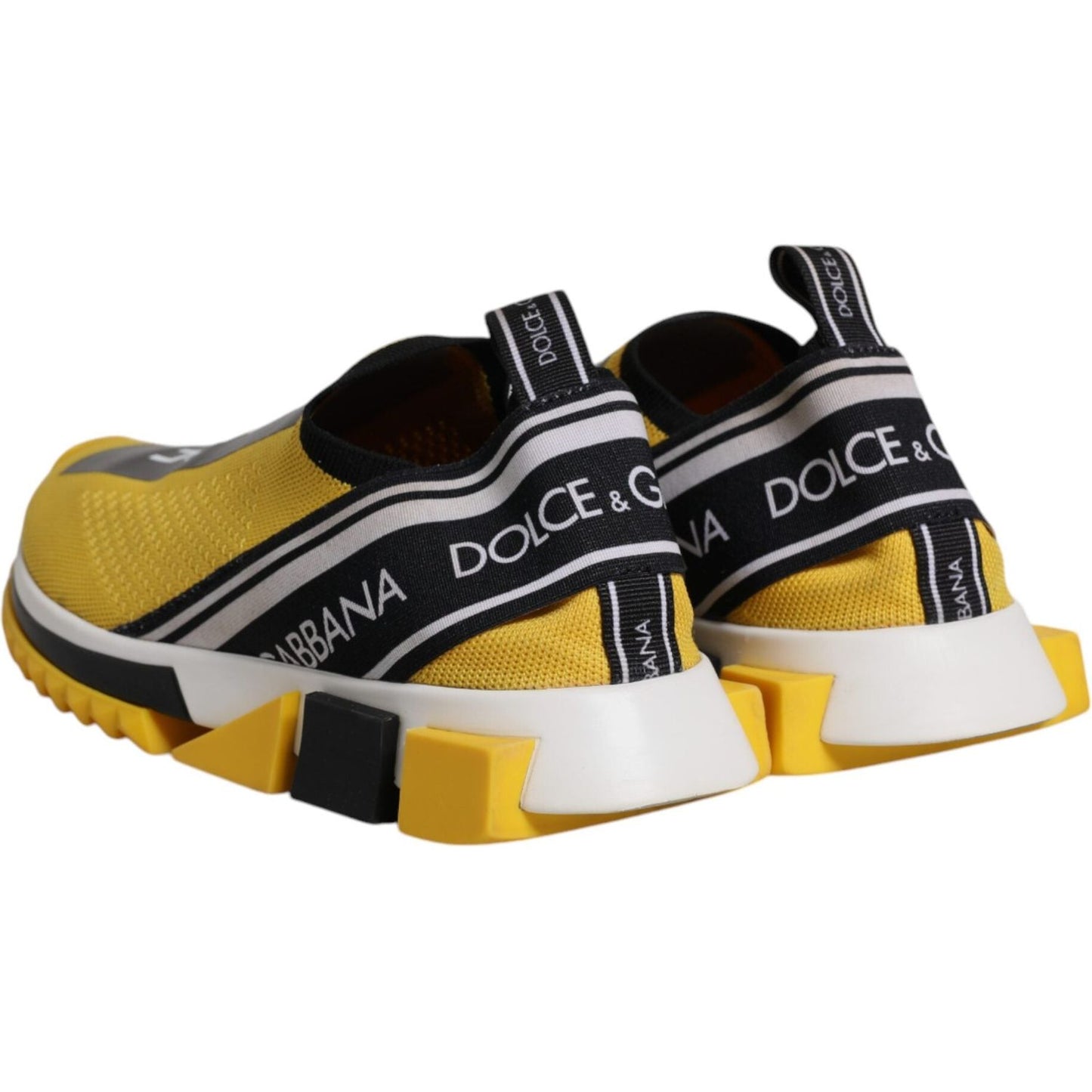 Dolce & Gabbana Sorrento yellow black slip-on sneakers with logo print and rubber sole, back view, featuring pull strap. Made in Italy.
