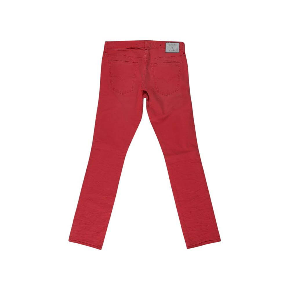 Back view of Guess red skinny cotton jeans for men, fall/winter collection, featuring a blend of 98% cotton and 2% spandex.