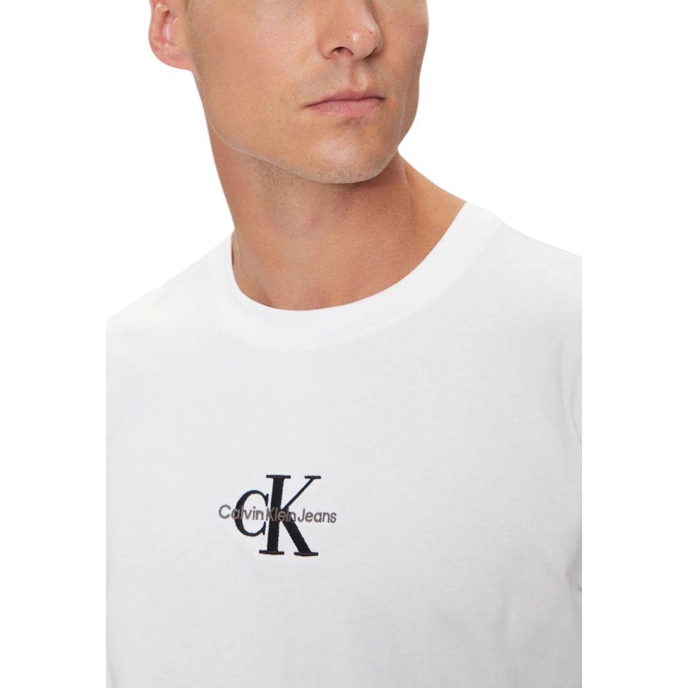 Man wearing Calvin Klein Jeans white recycled cotton t-shirt with logo, minimalist design for a casual look.