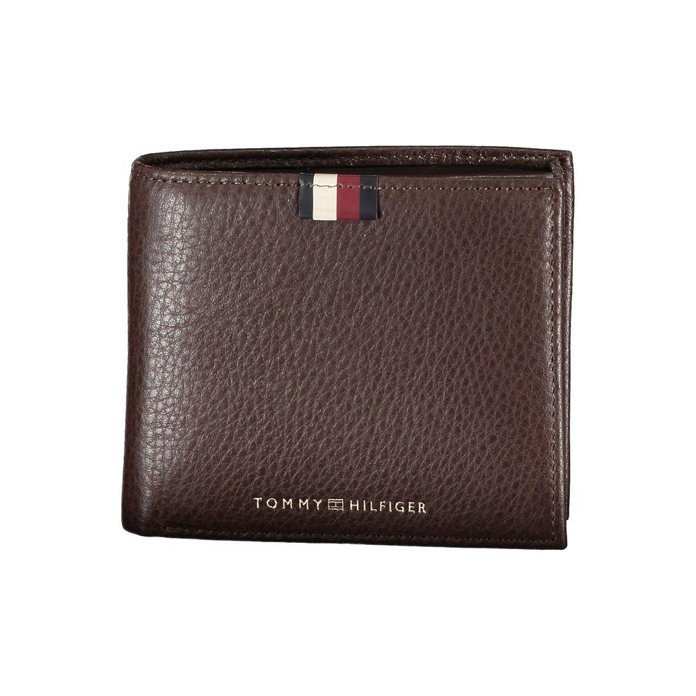 Tommy Hilfiger brown leather men's wallet with logo, featuring dual compartments, card slots, and coin purse for sophisticated style.