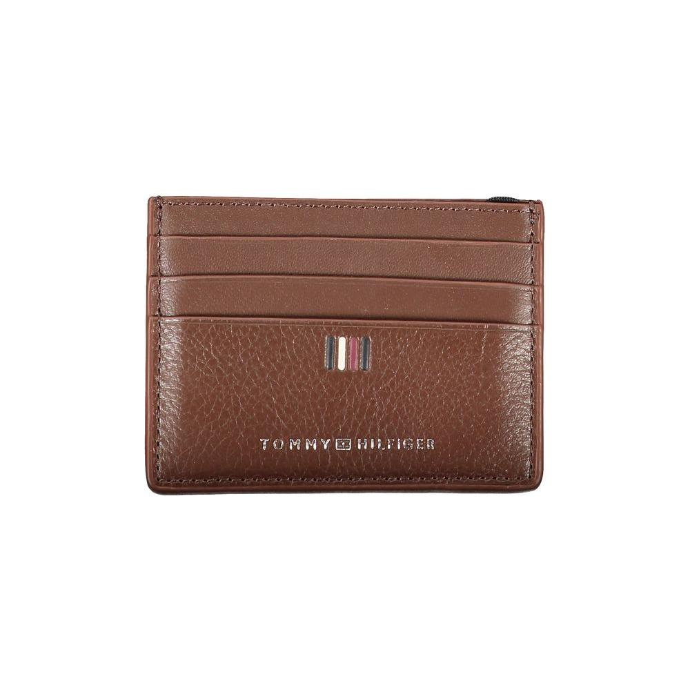 Tommy Hilfiger brown leather card holder with contrast detailing and embossed logo, featuring multiple card slots for modern convenience.