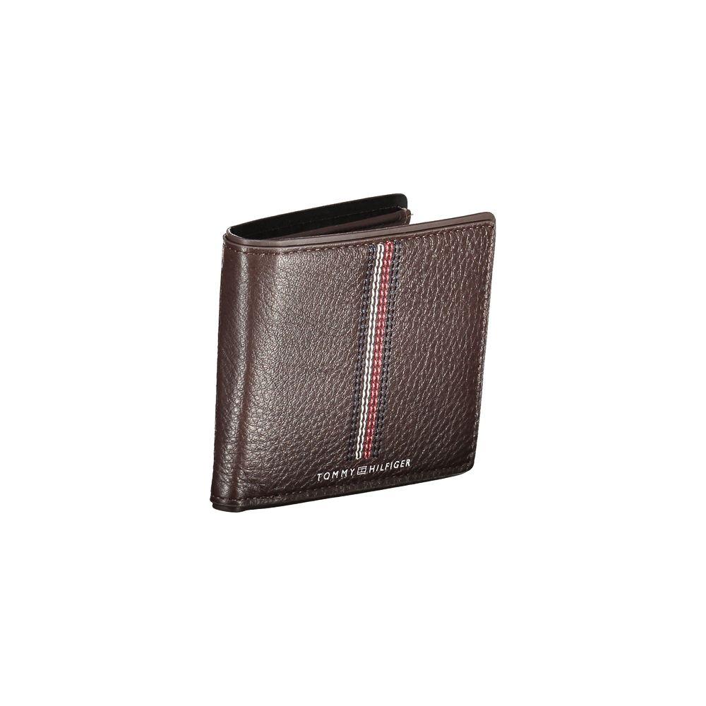 Tommy Hilfiger brown leather wallet with 2 compartments, coin purse, card spaces, contrasting details, and logo print.