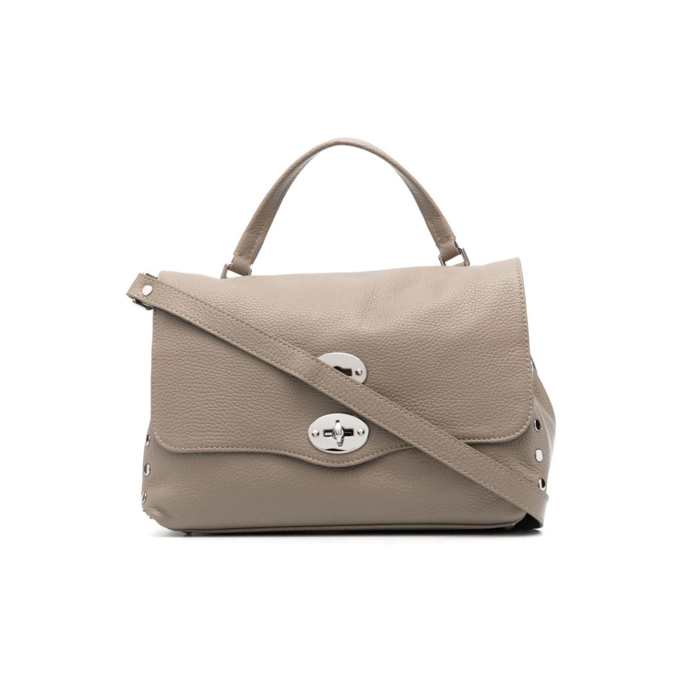 Front view with bag zipped and handles upright.