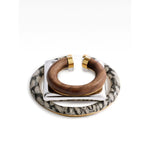 Jacquemus Trio of geometric ear-cuffs.