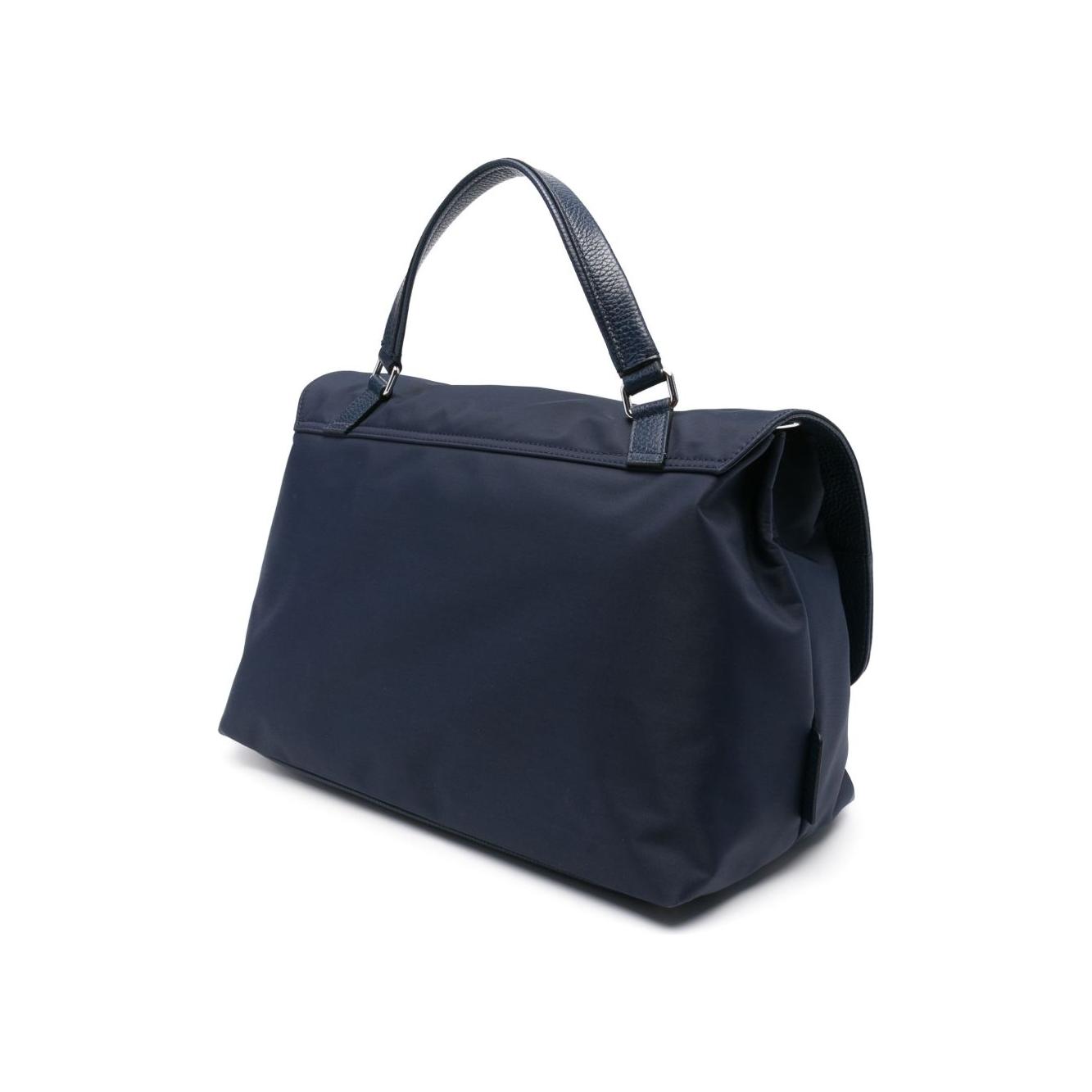 Front view with bag zipped and handles upright.