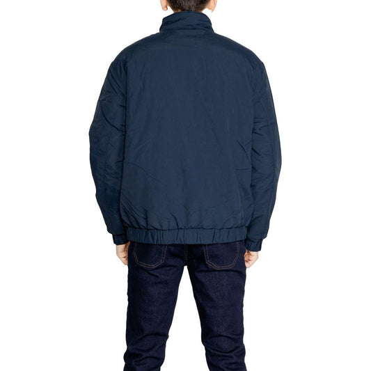 Back view of Tommy Hilfiger men's blue polyamide jacket from the fall/winter collection.