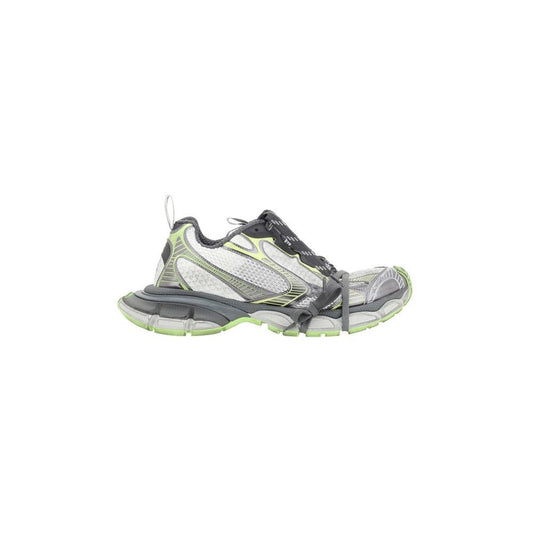 Side view of Balenciaga 3XL Sneakers featuring oversized design, chunky rubber sole, multiple laces, and mesh panels in gray and green.