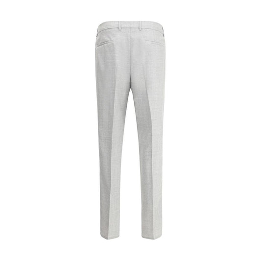 Back view of Brunello Cucinelli virgin wool pants with belt loops and welt pockets, showcasing sophisticated style and functionality.