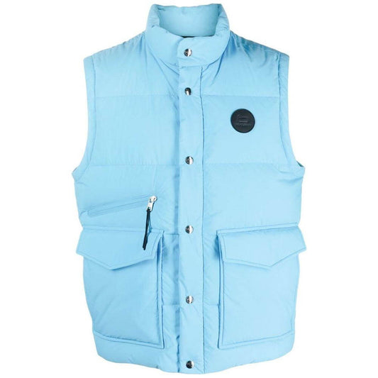 Woolrich light blue polyester vest with goose down padding, front pockets, button and zip fastening. Technical fabric vest.