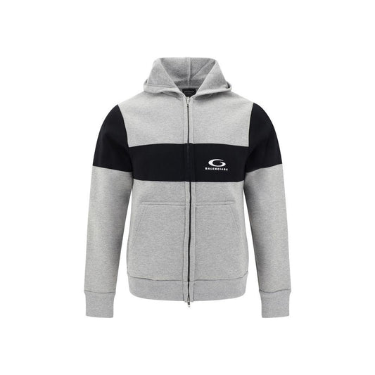 Balenciaga cotton hoodie with contrasting panel design, featuring a double-slider zipper and side welt pockets for a modern urban style.