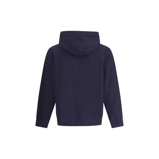 Back view of C.P. Company navy cotton hoodie with a hood and ribbed cuffs, showcasing minimalist design.