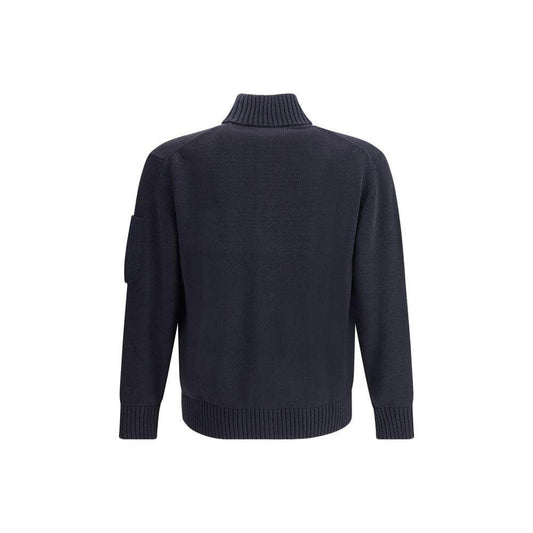 Back view of C.P. Company Cotton Cardigan featuring ribbed high collar and hem, showcasing its functional and stylish design.