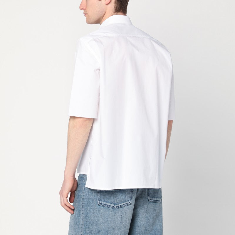 Front view with bag zipped and handles upright.